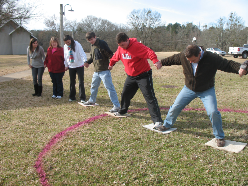 Children doing leadership exercises.